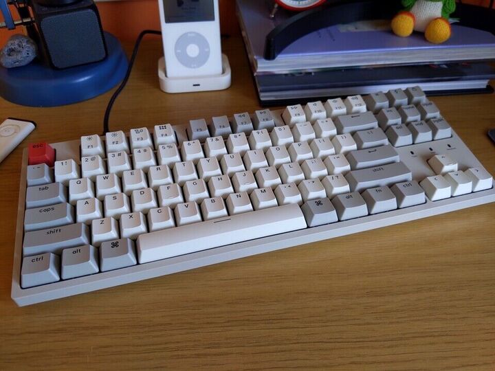 A grey and creamy white keyboard