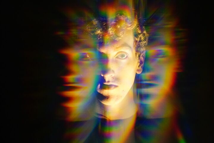 A portrait of evan, using a diffraction filter that splits the images many times in a creepy fashion.